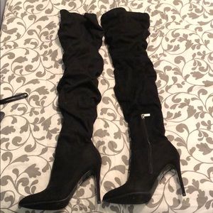 Black thigh high boots